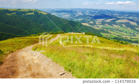 trail path down the hillside of gemba mountain also called hymba. beautiful carpathian landscape of ukraine in summer. popular travel destination trail path down the hillside of gemba mountain also called hymba. beautiful carpathian landscape of ukraine in summer. popular travel destination 114379038
