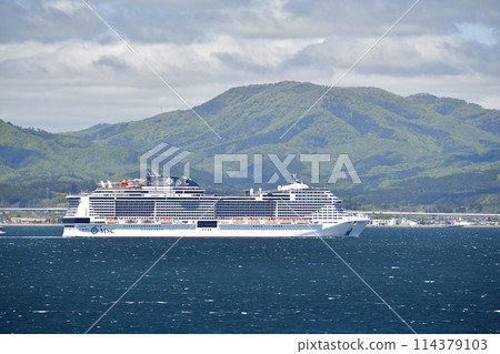 A photo of the cruise ship MSC Bellissima sailing through Hakodate Bay in Hakodate City in early summer A photo of the cruise ship MSC Bellissima sailing through Hakodate Bay in Hakodate City in early summer 114379103