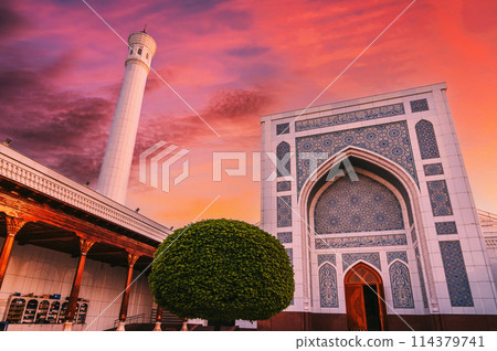 new Islamic Masjid Minor Mosque in Tashkent in Uzbekistan on background of dramatic red sunset sky new Islamic Masjid Minor Mosque in Tashkent in Uzbekistan on background of dramatic red sunset sky 114379741