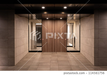 Luxury apartment at night, auto-lock entrance Luxury apartment at night, auto-lock entrance 114381756