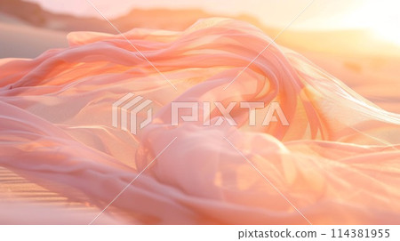 A pink fabric is spread out on the sand, with the sun shining on it A pink fabric is spread out on the sand, with the sun shining on it 114381955