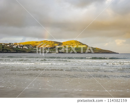 Beautiful rainbow at Portnoo Narin beach in County Donegal - Ireland. 114382159