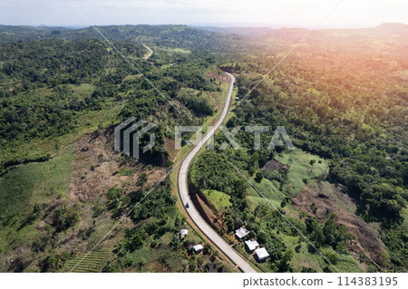 Lorry driving on mountain road 114383195