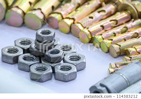 Close up scene the set of special nuts and zinc coating bolts for construction purpose. Close up scene the set of special nuts and zinc coating bolts for construction purpose. 114383212
