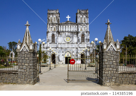 Phu Yen, Vietnam - March 9, 2022 : View Of Mang Lang Church On A Sunny Day. Mang Lang Church Is One Of The Oldest Churches In Vietnam Imbued With An Architectural Style Of The 19th Century. 114385196