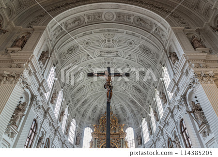 Jesus hanging on the cross, Crucifix in the interior of St. Michael's Church (Michaelskirche Jesuit church) in Munich. Jesus hanging on the cross, Crucifix in the interior of St. Michael's Church (Michaelskirche Jesuit church) in Munich. 114385205