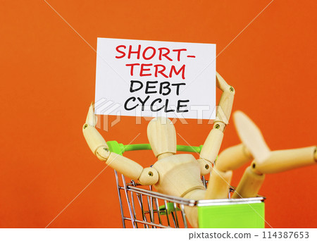 Short-term debt cycle symbol. Concept words Short-term debt cycle on beautiful white paper. Beautiful orange background. Businessman model. Business Short-term debt cycle concept. Copy space Short-term debt cycle symbol. Concept words Short-term debt cycle on beautiful white paper. Beautiful orange background. Businessman model. Business Short-term debt cycle concept. Copy space 114387653