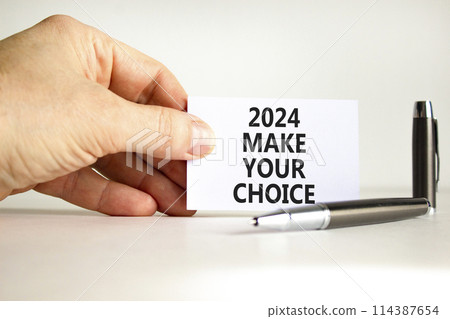 2024 Make your choice symbol. Concept words 2024 Make your choice on beautiful white paper. Beautiful white background. Voter hand. Business 2024 Make your choice concept. Copy space 114387654