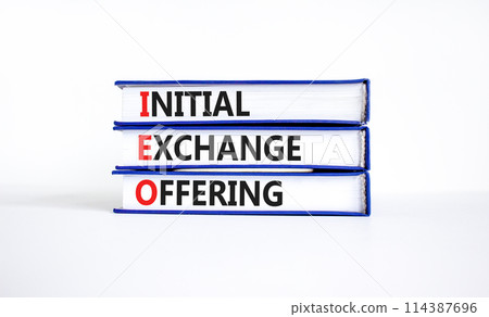 IEO initial exchange offering symbol. Concept words IEO initial exchange offering on beautiful books. Beautiful white background. Business IEO initial exchange offering concept. Copy space. 114387696