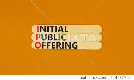IPO initial public offering symbol. Concept words IPO initial public offering on beautiful wooden stick. Beautiful orange background. Business IPO initial public offering concept. Copy space. 114387702