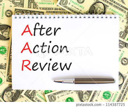 AAR After action review symbol. Concept words AAR After action review on beautiful white note. Dollar bills. Beautiful dollar bills background. Business AAR after action review concept. Copy space. AAR After action review symbol. Concept words AAR After action review on beautiful white note. Dollar bills. Beautiful dollar bills background. Business AAR after action review concept. Copy space. 114387725