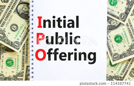 IPO initial public offering symbol. Concept words IPO initial public offering on beautiful white note. Beautiful dollar bills background. Business IPO initial public offering concept. Copy space. 114387741