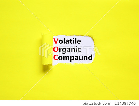 VOC volatile organic compound symbol. Concept words VOC volatile organic compound on beautiful white paper. Beautiful yellow background. Business VOC volatile organic compound concept. Copy space. 114387746