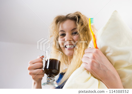 Funny woman being late drinking coffee Funny woman being late drinking coffee 114388552