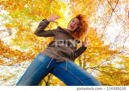 Girl having fun in forest. Girl having fun in forest. 114389230