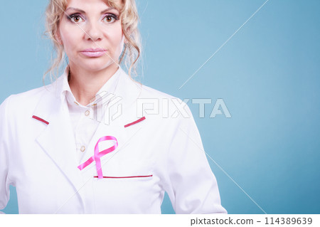 Doctor with pink cancer ribbon Doctor with pink cancer ribbon 114389639
