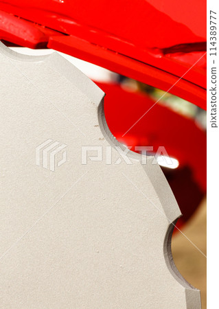 Detailed closeup of grey cutting disc Detailed closeup of grey cutting disc 114389777