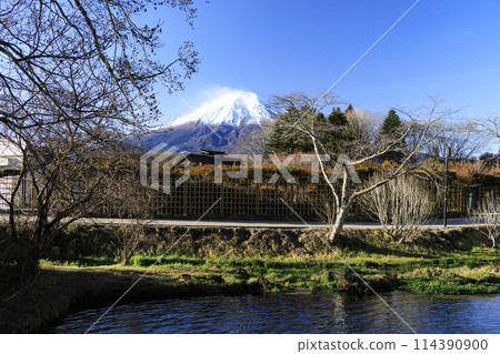 Snow-capped Mount Fuji, a World Heritage Site, as seen from Oshino Hakkai Snow-capped Mount Fuji, a World Heritage Site, as seen from Oshino Hakkai 114390900