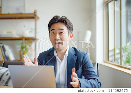Businessmen holding a meeting during telework AI image 114392475