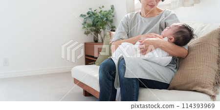 Mother holding a baby Mother holding a baby 114393969
