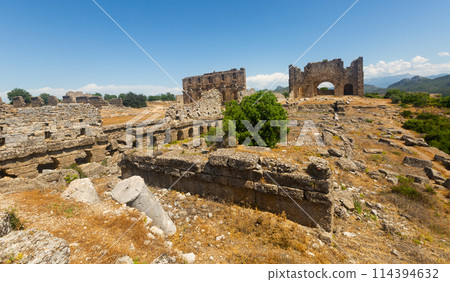 Ruins of the roman bazilica and nymphaeum in the antiquity city of Aspendos Ruins of the roman bazilica and nymphaeum in the antiquity city of Aspendos 114394632