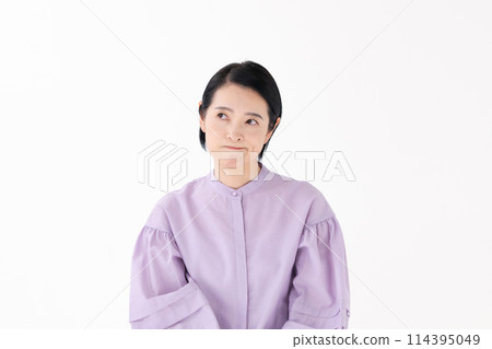 Middle-aged woman portrait worried 114395049