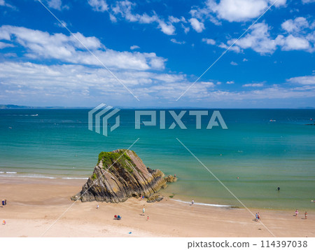 White sand beach with large rocks (Tenby, Wales, UK) 114397038