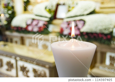 Funeral material image of a quiet image of a candle and a Buddha flower funeral 114397405