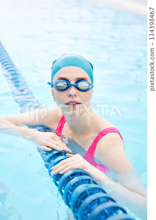 glamour attractive female swimmer in pool 114398467