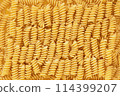 Fusilli Pasta Symphony, Inspirational Noodle Backdrop. Gastronomic Canvas 114399207