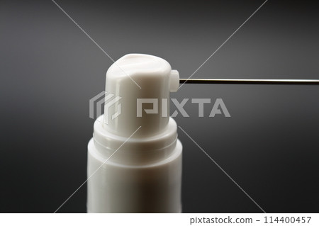 A spray with a metal nozzle 114400457