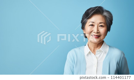 Elderly asian woman in clean background for copyspace template. Adult middle-aged female person. Cheerful happy portrait. AI generated 114401177