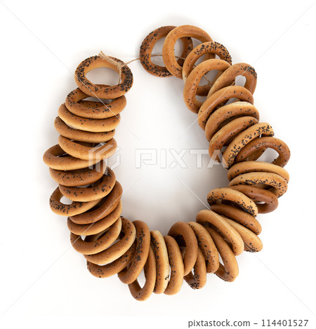 bunch of pastry bagels on white background 114401527