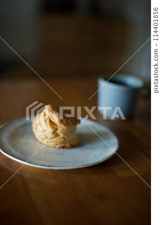 Hot coffee and scones for snack 114401856