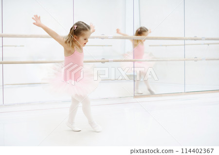 Little ballerina at ballet class 114402367