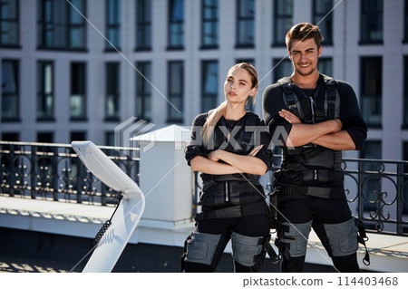 exercises for people on electro-muscular machine 114403468