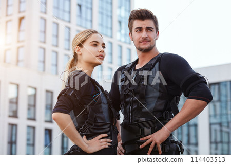 two joyful sportsmen are in black suits for rms training 114403513