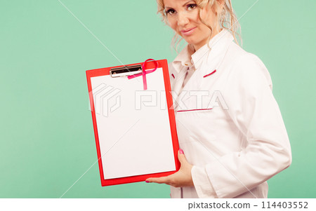 Female doctor with folder and pink ribbon Female doctor with folder and pink ribbon 114403552