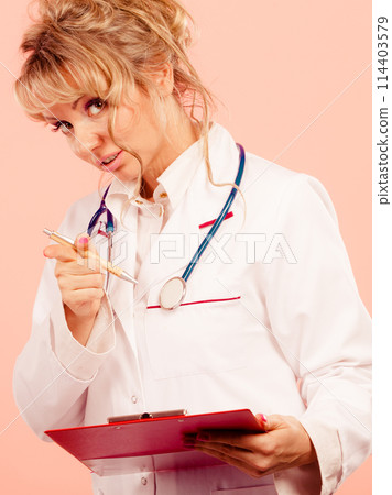 Middle aged female medical doctor. 114403579