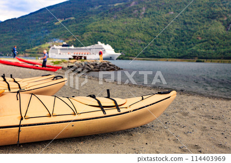 Kayaks and cruise ship in Flam, Norway 114403969