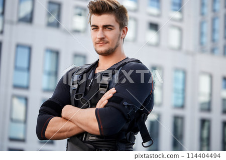 strong unshaven guy posing to the camera strong unshaven guy posing to the camera 114404494