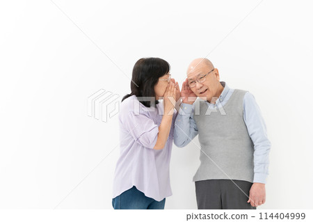 Senior couple hearing loss Senior couple hearing loss 114404999