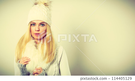 Attractive woman wearing winter clothes. Attractive woman wearing winter clothes. 114405129