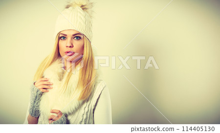 Attractive woman wearing winter clothes. Attractive woman wearing winter clothes. 114405130