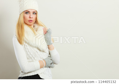 Attractive woman wearing winter clothes. Attractive woman wearing winter clothes. 114405132