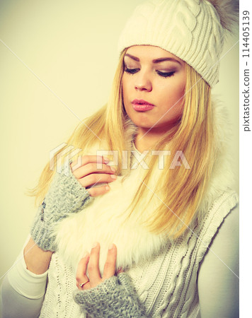 Attractive woman wearing winter clothes. Attractive woman wearing winter clothes. 114405139