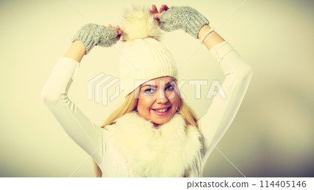 Woman wearing warm winter clothing 114405146