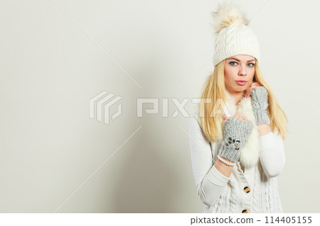 Attractive woman wearing winter clothes. 114405155