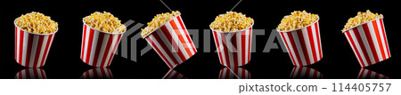 Set of paper striped bucket with popcorn isolated on black background 114405757