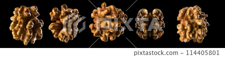 Macro photo of empty shell of walnut isolated on a black with clipping path Macro photo of empty shell of walnut isolated on a black with clipping path 114405801